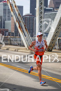 Patrick Evoe runs strong and extends lead at the 2012 Ironman Louisville on August 26, 2012 in Louisville, Kentucky