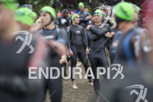 Age groupers prepare to start the on the swim at the 2013 Ironman Coeur D'alene in Coeur D'alene, Idaho, ID on June 23, 2013.