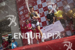 Javier Gomez Noya celebrates victory at the 2013 Beijing International Triathlon on September 21, 2013 in Beijing, China.