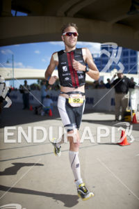Jens Petersen-Bach in hot pursuit during the run at Ironman Arizona on November 17, 2013 in Tempe, AZ.