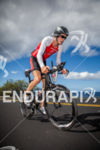 Trevor Wurtele climbs to Hawi on bike at the Ironman…